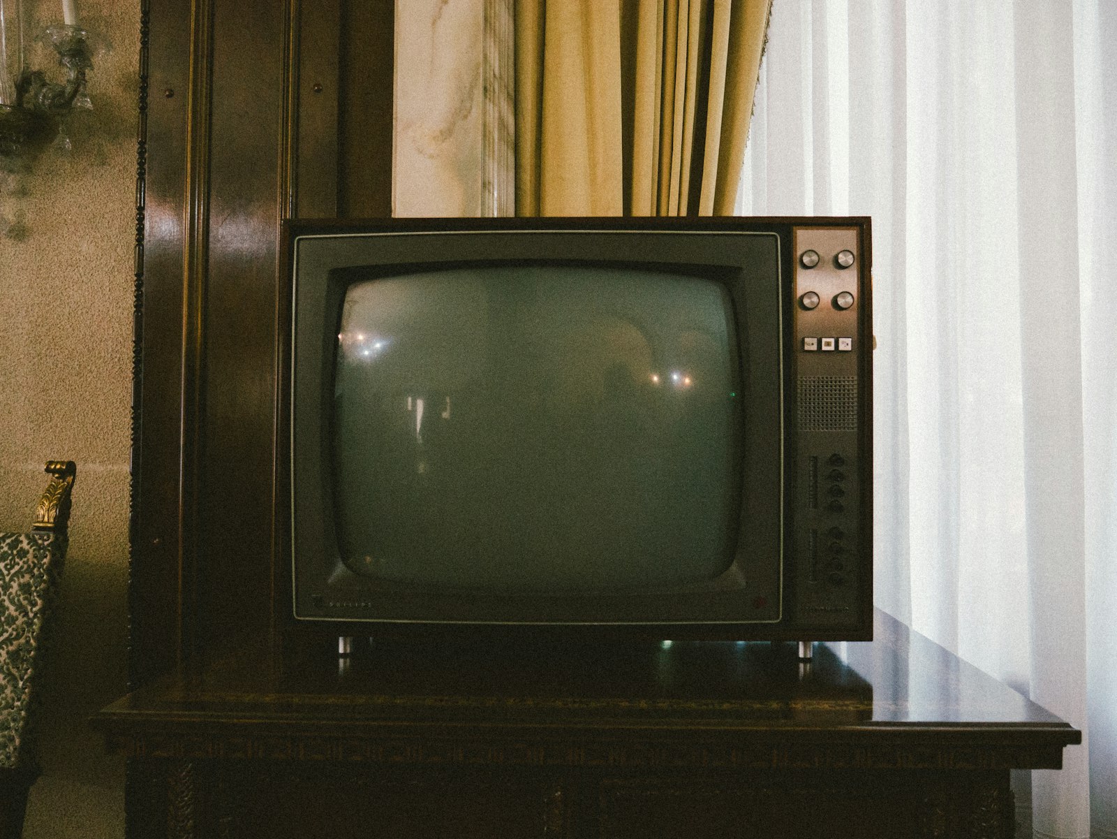 Broadcast-era CRT television on a sideboard